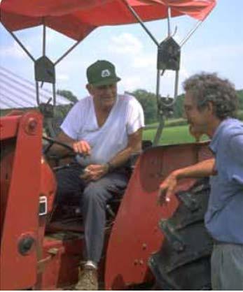 Farmer talking with Agricultural agent