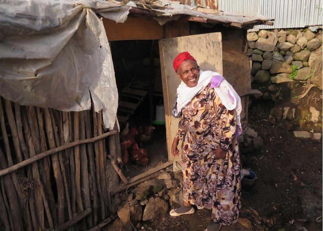 Women shows her hen house