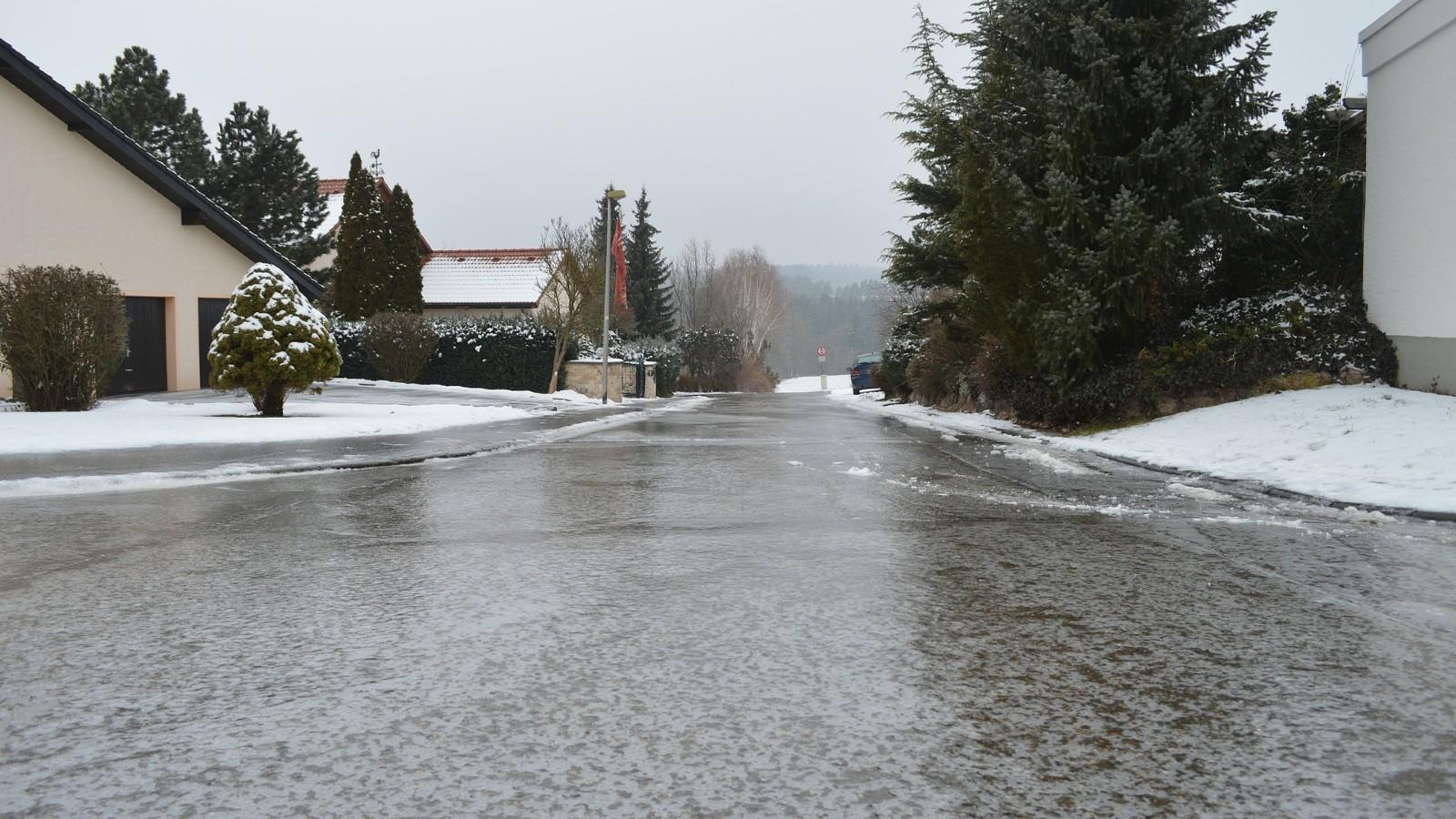 black ice on suburban street