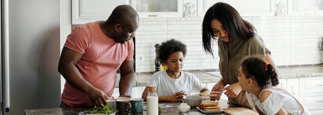 Family eating dinner together.