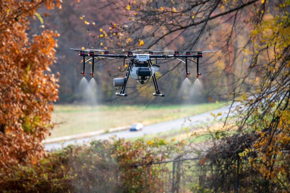 A drone spraying pesticide