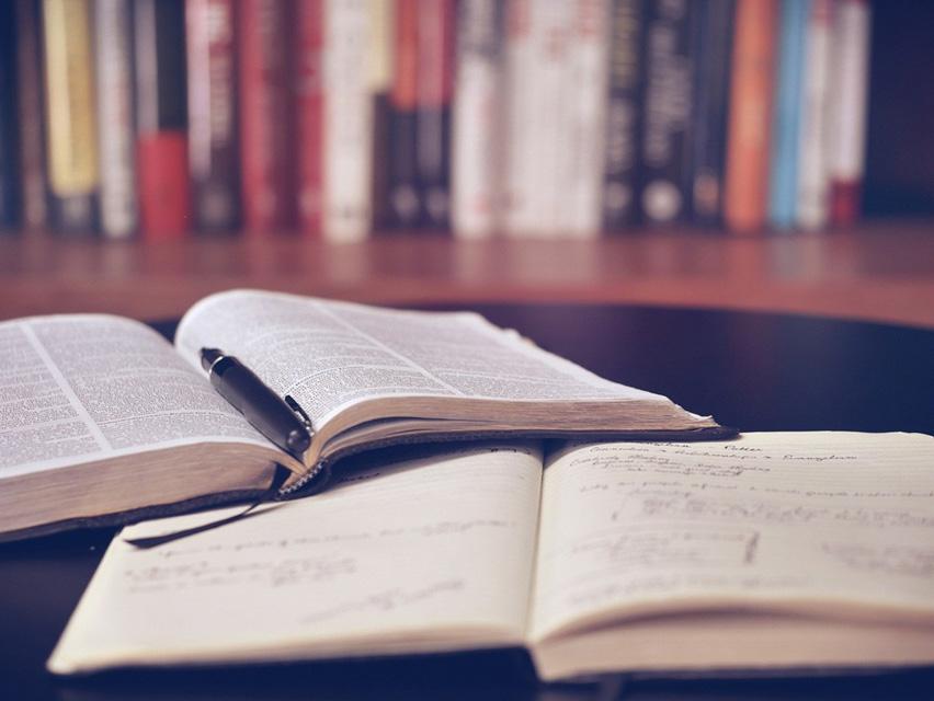 Open books on a table 