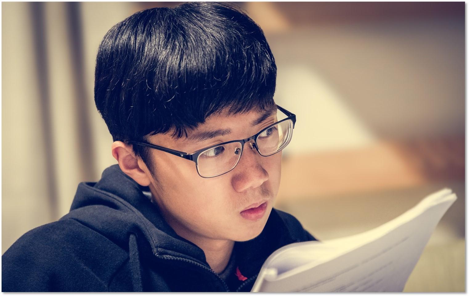 A young man reading