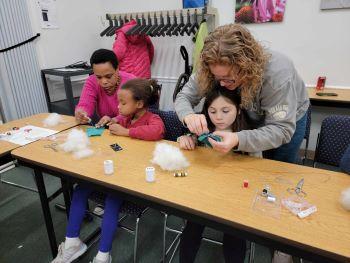 Chesapeake Clover Members and adults working on project