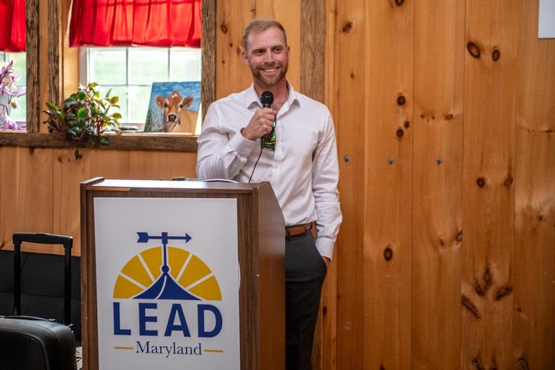 Adam Miller at podium Class XII Graduation